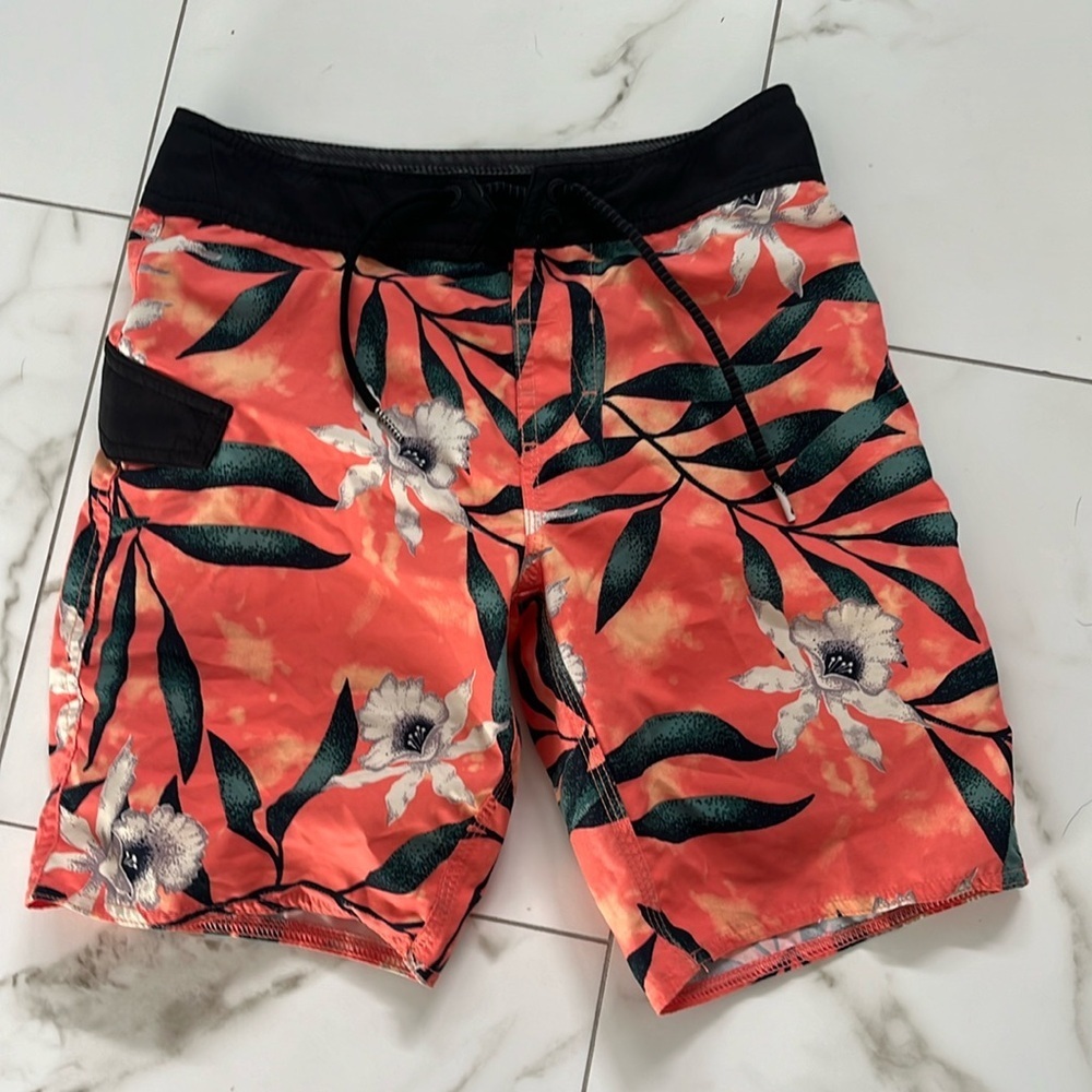 Volcom orange and floral patterned swim trunks